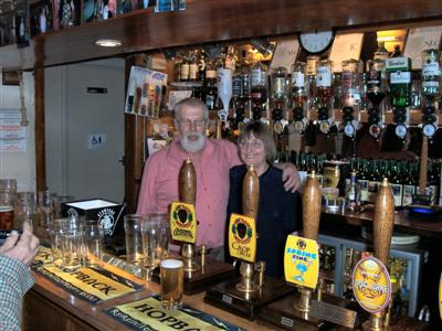 Bob & Lin behind the bar