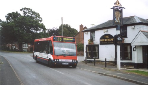 A Wilts & Dorset bus in front of The Wheatsheaf