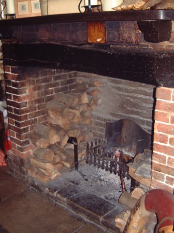 The fireplace is the main feature of the back bar